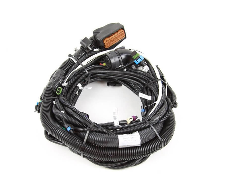 An engine-to-cab wiring harness with ECM, Chassis and sensor connectors including protective corrugated split-loom.